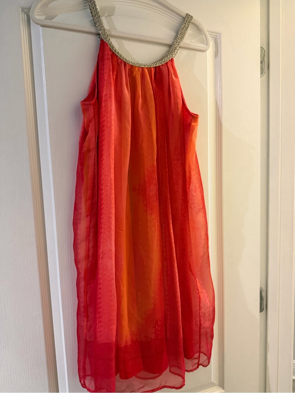 Charming Charlies orange and red braided silver neckline dress